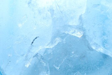 Naklejka premium Texture of clear ice as background, closeup