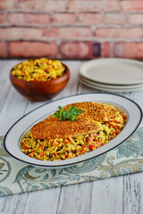 pan roasted jerk rubbed fish fillets on a bed of beans and rice