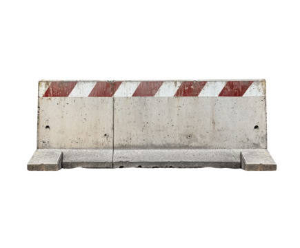 Concrete Barrier: A detailed shot of a concrete road barrier with diagonal red and white stripes on the top.