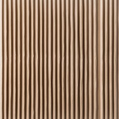 Obraz premium Close up texture of light brown corrugated cardboard with vertical lines. The image shows a detailed view of the material's surface and texture.