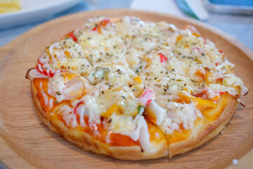Delicious homemade pizza with fresh toppings kitchen food cozy atmosphere close-up view