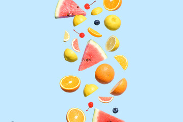 Fresh and colorful citrus fruit isolated on a blue background, ideal for food branding, advertising, packaging, nutrition blogs, healthy lifestyle promotions, and and much more... Summer concept.