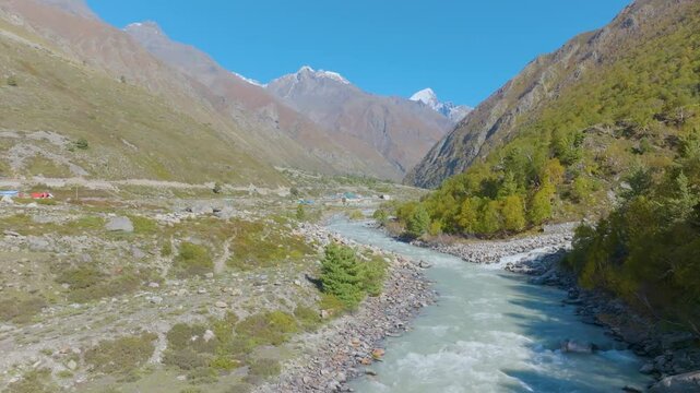 Drone footage Chitkul Valley in Himachal Pradesh with Mountains and River

