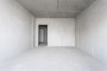 interior of the apartment without decoration in gray colors. rough finish
