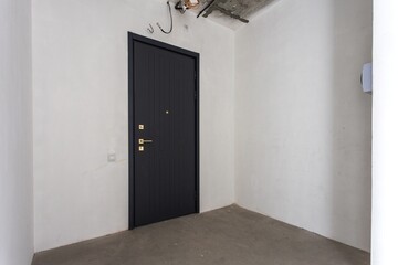 interior of the apartment without decoration in gray colors. rough finish