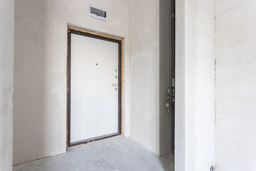 interior of the apartment without decoration in gray colors. rough finish
