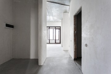interior of the apartment without decoration in gray colors. rough finish