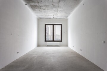 interior of the apartment without decoration in gray colors. rough finish