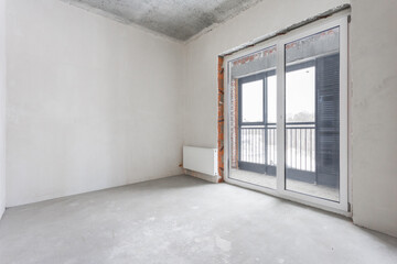interior of the apartment without decoration in gray colors. rough finish