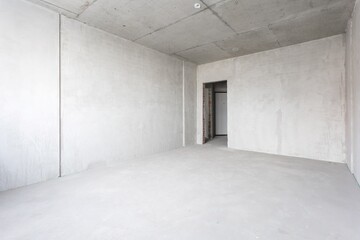 interior of the apartment without decoration in gray colors. rough finish