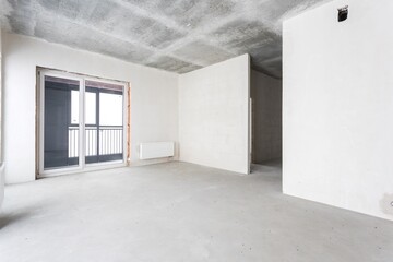 interior of the apartment without decoration in gray colors. rough finish