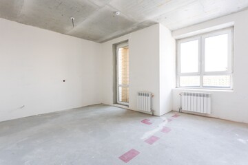 interior of the apartment without decoration in gray colors. rough finish
