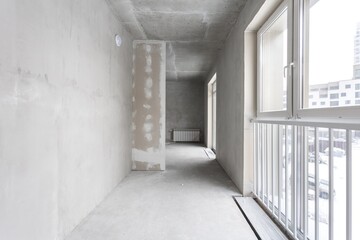 interior of the apartment without decoration in gray colors. rough finish