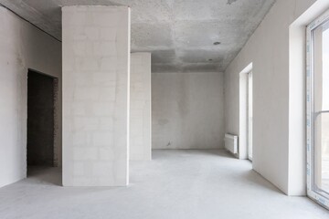 interior of the apartment without decoration in gray colors. rough finish