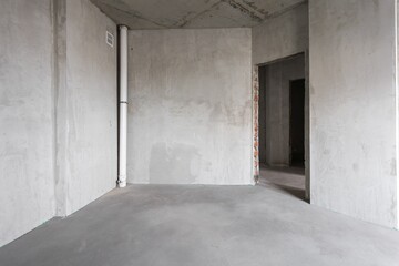 interior of the apartment without decoration in gray colors. rough finish