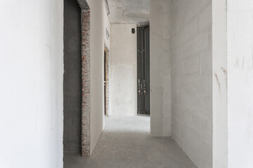 interior of the apartment without decoration in gray colors. rough finish