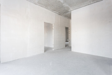 interior of the apartment without decoration in gray colors. rough finish