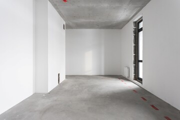 interior of the apartment without decoration in gray colors. rough finish