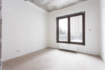 interior of the apartment without decoration in gray colors. rough finish