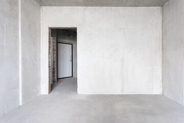 interior of the apartment without decoration in gray colors. rough finish