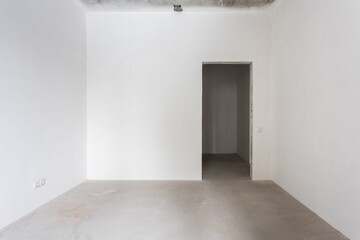 interior of the apartment without decoration in gray colors. rough finish