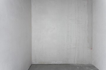 interior of the apartment without decoration in gray colors. rough finish