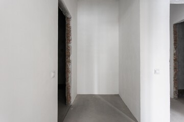 interior of the apartment without decoration in gray colors. rough finish
