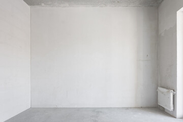 interior of the apartment without decoration in gray colors. rough finish