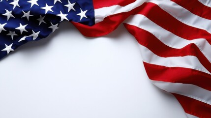 Obraz premium Waving American flag draped gracefully on a plain background showcasing patriotic colors and symbolism of unity
