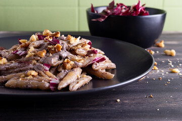 Pasta with radicchio, ricotta and walnuts.