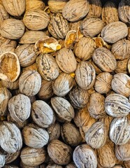 Box of whole and cracked walnuts