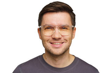 Smiling man wearing glasses against a plain background during a casual indoor setting