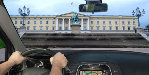 Driving a car towards the Royal Palace in Oslo, Norway