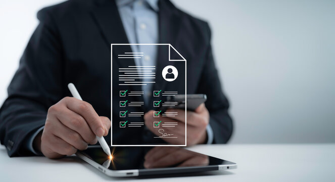 Businessman signing a digital document on a tablet, representing online contract approval, electronic signatures, and business document verification