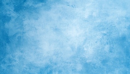 Obraz premium A textured blue background with soft gradients, evoking tranquility and calmness, suitable for various design applications.