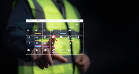 Worker in a high-visibility vest interacting with a futuristic digital calendar interface,...