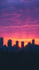 Fototapeta premium Vibrant city skyline at sunset fiery orange and purple cloudscape dramatic cityscape urban landscape evening twilight