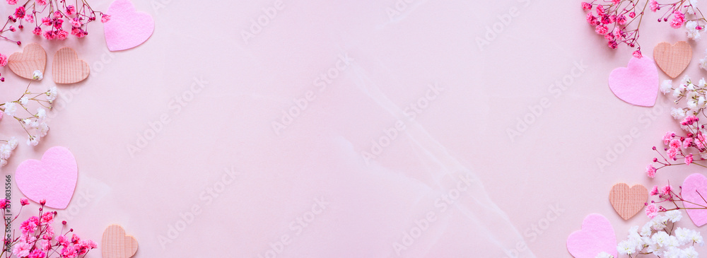 Poster mothers day heart and flower double border. overhead view on a pink stone banner background. copy sp