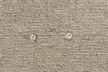 Seamless texture of mineral wool facade insulation with visible mechanical fasteners — ideal for construction visuals, architectural renders, and energy-efficient building design.