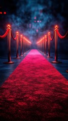 Red carpet entrance lined with velvet ropes and glowing lights creates an elegant setting for a special event