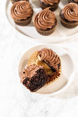 Chocolate Cupcake Sliced in Half on Kitchen Counter