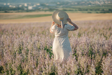 Woman Lavender Field Dress: Summer sunset stroll through purple flowers; enjoying nature's beauty.