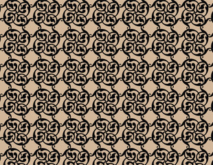 A decorative pattern in black and beige, featuring geometric shapes and flowing lines