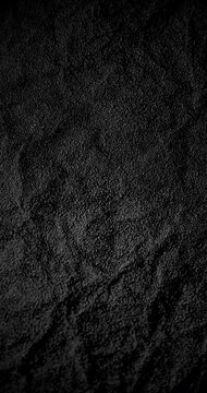 Crumpled Black Texture in Slow Motion. Sow-motion video of a crumpled black texture with smooth camera movement. Perfect for backgrounds, design, cinematic projects.