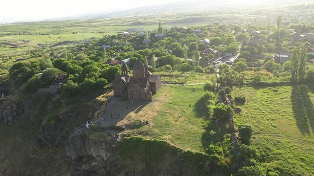 Tilting-down drone shot of the Saghmosavank monastery in Saghmosavan village in Aragatsotn, Armenia