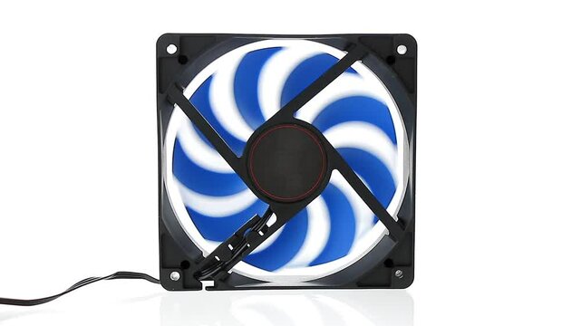 Computer fan running on isolated white background. Computer cooler slowly speeds up, runs at full power, slows down until it stops. Air cooling system.