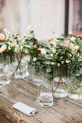Wedding table, flowers in vase