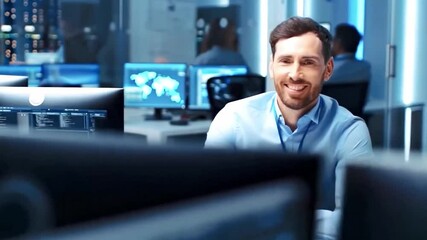 Smiling IT professional working in cybersecurity control room, monitoring global data on computer screens. Tech operations expert in secure office, network safety environment - Powered by Adobe
