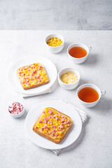 Cheese corn sausages baked sandwich in a plate