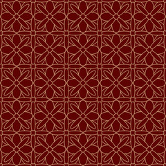 Seamless gold ornament on a red background. The composition of colorful elements creates a seamless pattern. National ornament. Idea for textiles, textures, prints, wallpapers, clothes